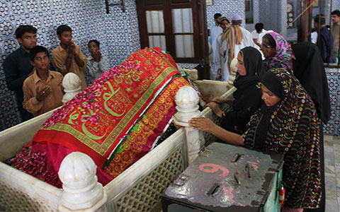 At the shrine of Abdullah Shah Ghazi, the patron Saint of Karachi.  Photos: Paaras Abbas