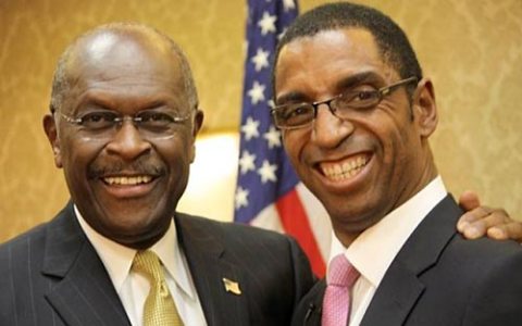 ‘Not surprised by bitter reviews’: Hargreaves, right, with former presidential candidate, Cain