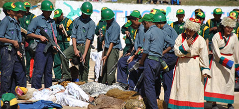 Assimilation Beijing-style: Students of a Tibetan school in Dharamsala, India, enact atrocities on Tibetans in Tibet by Chinese security personnel.  Photo: Vishal Arora Assimilation Beijing-style: Students of a Tibetan school in Dharamsala, India, enact atrocities on Tibetans in Tibet by Chinese security personnel.  Photo: Vishal Arora