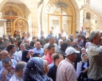 Church volunteers register thousands of homeless Syrians. Photo: IOCC/GOPA.