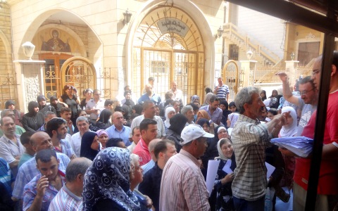 Church volunteers register thousands of homeless Syrians. Photo: IOCC/GOPA. Church volunteers register thousands of homeless Syrians. Photo: IOCC/GOPA.