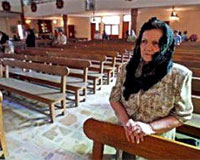 Assyrian woman prays in a Jordanian church - Photo: ASSIST News Service Assyrian woman prays in a Jordanian church - Photo: ASSIST News Service