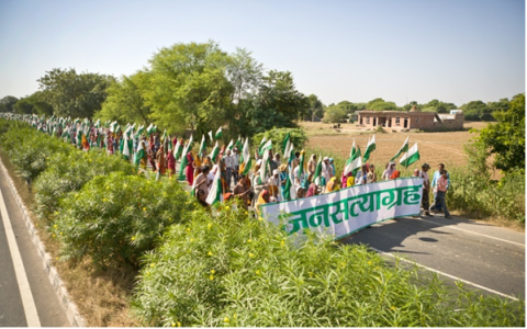 Banner: Jan Satyagraha – Non-Violent Protestors